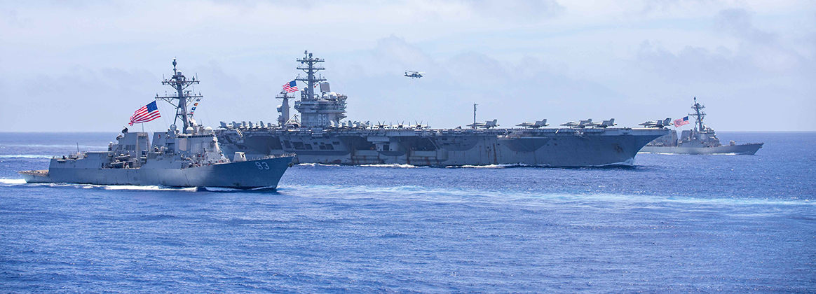 U.S. Navy carrier strike groups led by flagships USS Nimitz (CVN 68) and USS Ronald Reagan (CVN 76)